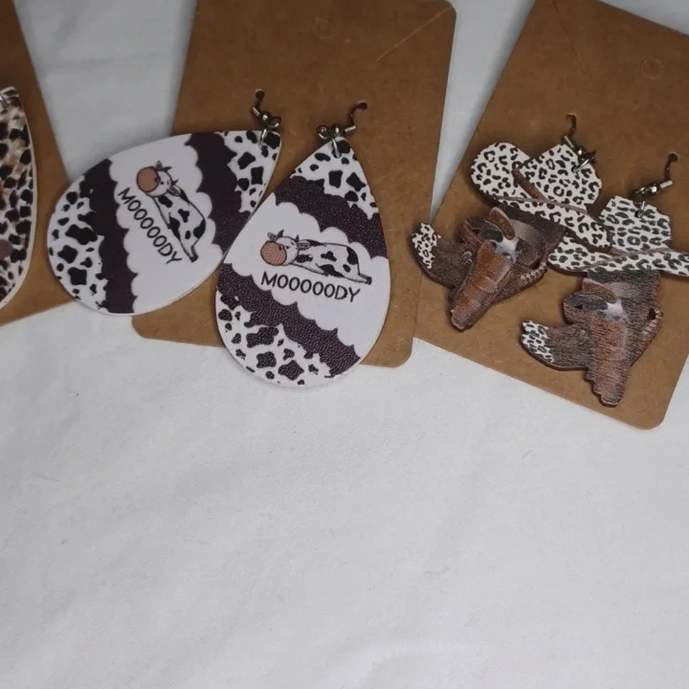 4 pair Cow dangle earrings